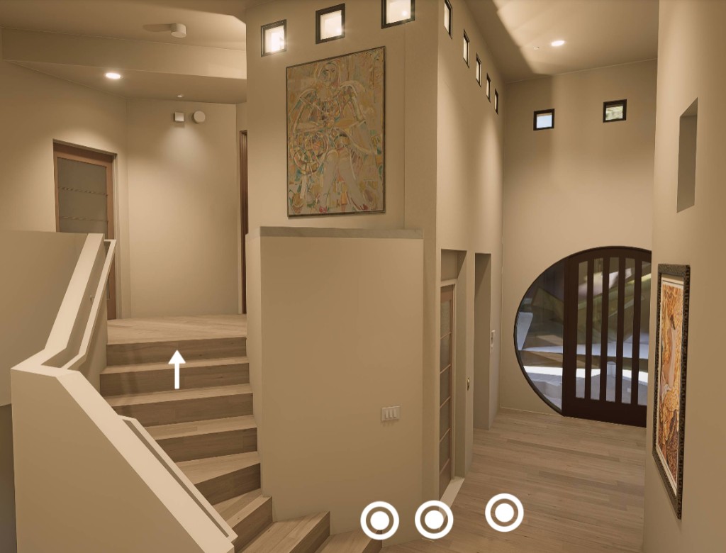 Elevator Retrofit remodel — interior with stair, artwork, and circular doorway hallway